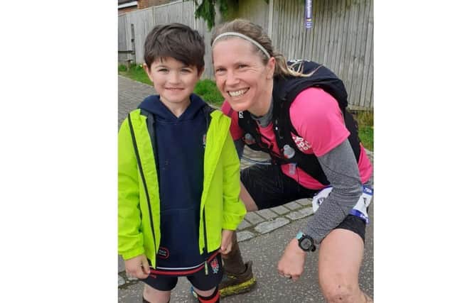 Sarah Page has taken part in a 75km race as a warm up before she takes on the 100 mile South Downs Way challenge next month for her godson, Charlie, who has rare condition that means that he could die when he sleeps.