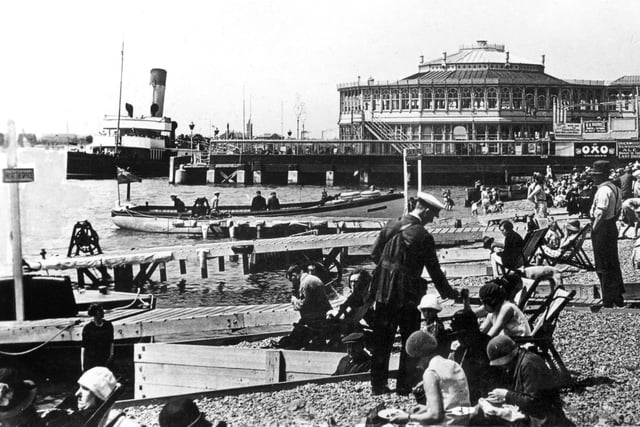 A Southsea deckchair attendant collecting money, while a steamer collects passengers for a leisurely cross-Solent trip which would cost 1s 6d (7.5p) from the old Clarence Pier, seen here about 1930.
Picture: Courtesy of John Sadden