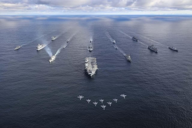 UK Carrier Strike Group with Nato allies.Front row: HMS Prince of WalesRow 2 (L-R): USS Paul Ignatius, ESPS Almirante Juan de Borbon, Row 3 (L-R): HMS Portland, HNLMS Karel Doorman, HNOMS Magnus Lagabote, RFA Tidespring, HNOMS Olav Tyrggvason, ITS Giuseppe Garibaldi, FS NormandieRow 4 (L-R): RFA Mounts Bay, HNOMS Otto Sverdrup, HNOMS Gnist, Kv Bjornoya, FGS Bonn