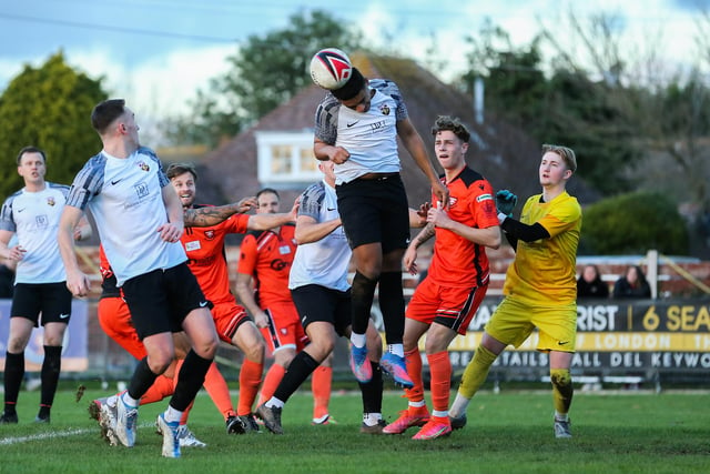 A Pagham defender heads clear. Picture by Nathan Lipsham