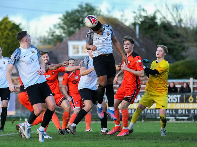 A Pagham defender heads clear. Picture by Nathan Lipsham