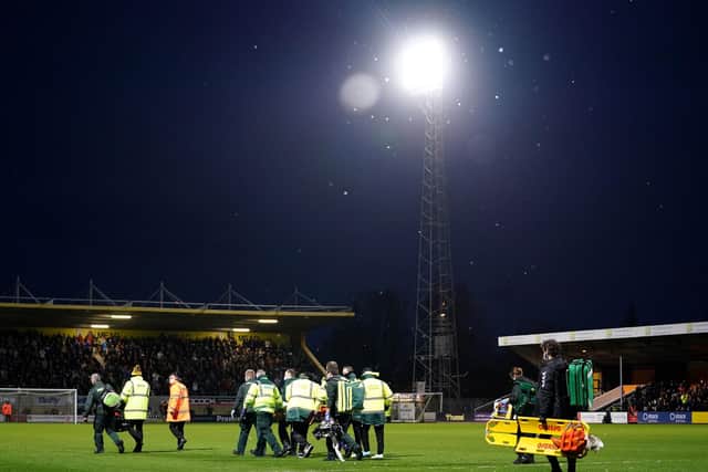 Cambridge fan Daniel Brown has paid tribute to the medical staff who came to his aid after he collapsed on Monday. Zac Goodwin/PA Wire.