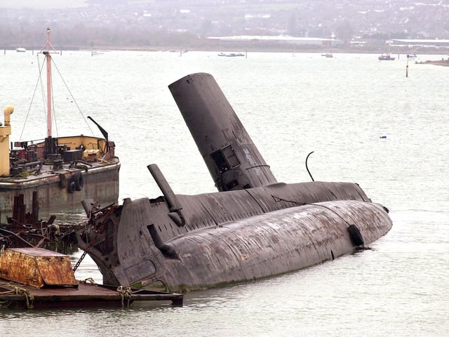 The former HMS Osiris languishing in Pounds Shipyard at Tipner beside the M275, at the entrance to The City of Portsmouth 20th November 2002. Picture: Malcolm Wells 025829-95