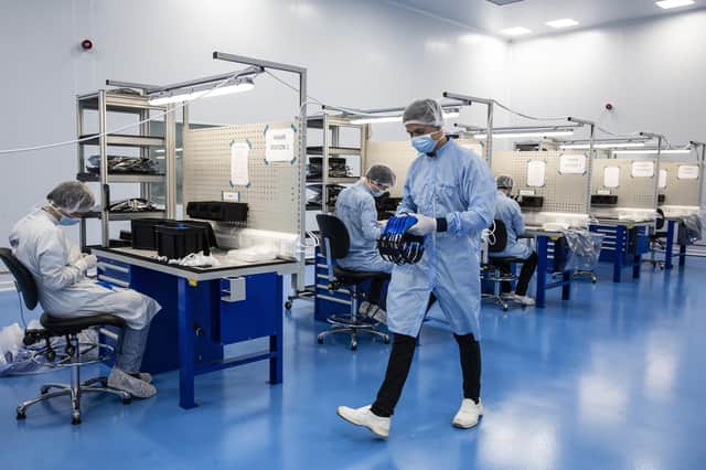 Airbus space craft assembly technicians making face shields for the NHS inside the Jupiter Cleanroom at Airbus Defence and Space in Portsmouth. Picture: Heathcliff O'Malley