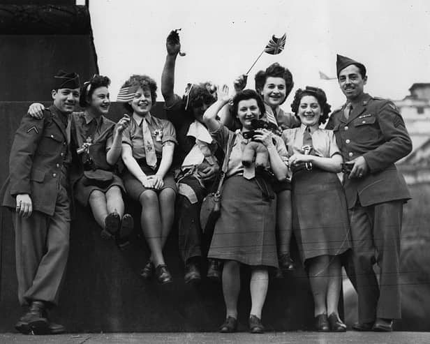 A group of ATS and American soldiers celebrate VE Day in Trafalgar Square (Photo: Keystone/Getty Images)