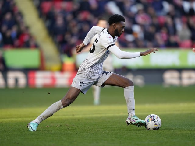 Abu Kamara bursts forward with the ball