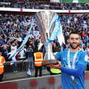 Ben Close celebrates the Checkatrade Trophy win in 2019.