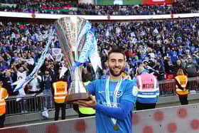Ben Close celebrates the Checkatrade Trophy win in 2019.