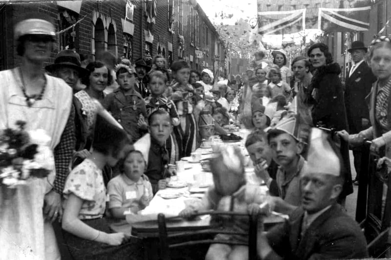 Sent in by Ron Coombs of Bedhampton we see street party in progress in Highfield Street, Landport on 12 May 1937. Ron's mother made Coronation suits for the boys and also the flags. In the photo are Roy Meech who's father went down on HMS Barham and also two boys with the surnames of Bartlett and Bouchet. They both joined the navy as boy seamen and were lost when the battle cruiser HMS Hood went down in 1941.