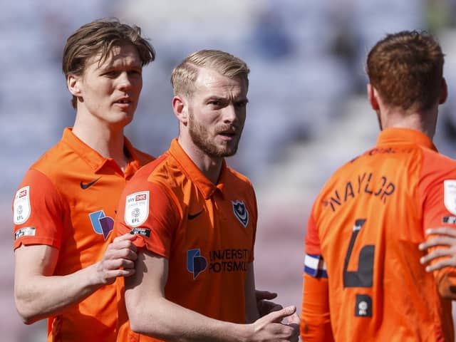 Sean Raggett, left, and former Pompey team-mate Jack Whatmough. Picture: Daniel Chesterton/phcimages.com