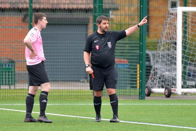 Dismissed - Harvest's Jay Kane is sent off in the second half of his side's cup win over Clanfield. Picture: Martyn White.