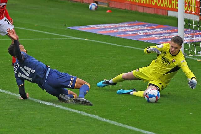 Pompey target Josh Griffiths denies Mansfield's James Perch in a League Two fixture this season. Picture: Gareth Williams/AHPIX LTD