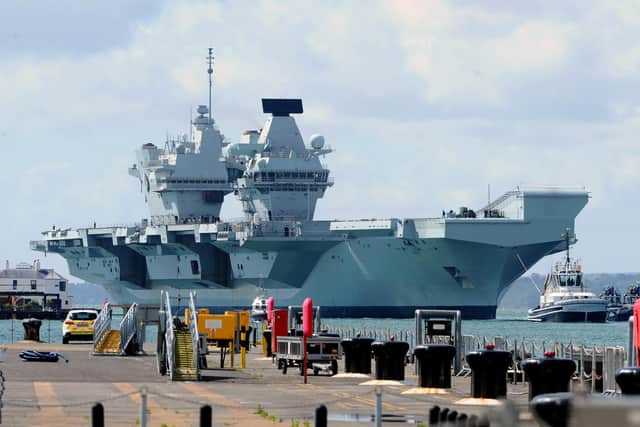 Britain's biggest warship HMS Queen Elizabeth pictured returning to Portsmouth after 10 weeks at sea, carrying out critical training.

Picture: Sarah Standing (020720-5149)