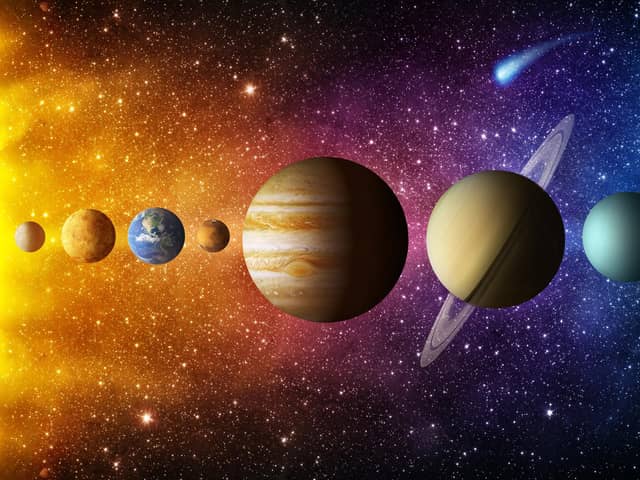 The Solar System (and definitely no Pluto). Elements of this image furnished by NASA, picture by Shutterstock.