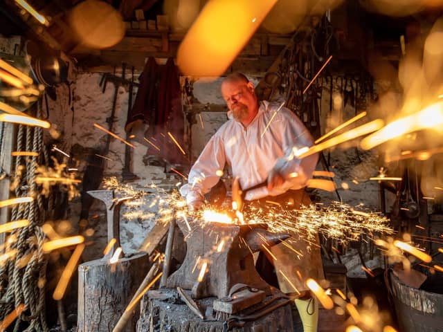 The blacksmith at Little Woodham Living Village in Gosport. Picture: Mike Cooter (060424)