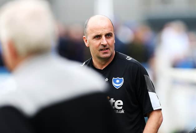 Paul Cook is a free agent, but realistically will not be coming back to Fratton Park in the immediate future. Picture: Joe Pepler