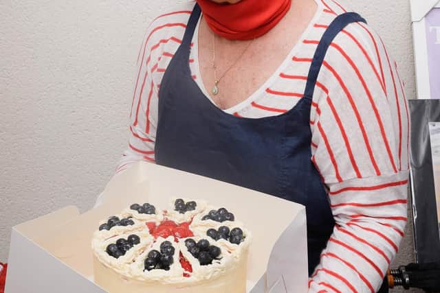 Noreen Haig, who won best cake competition at the Spice Island party.
Picture: Keith Woodland (040621-14)
