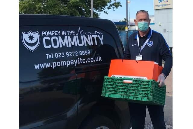 Pompey in the Community has been boosted by a donation of £100k from Barclays. Pictured: Portsmouth legend Alan Knight helping out with food deliveries