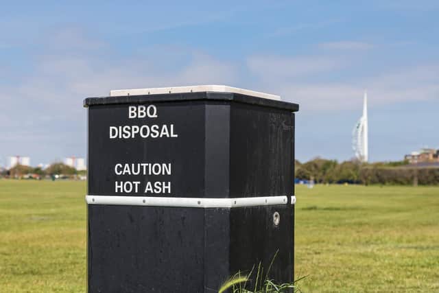 The black bins on Southsea Common are designed to accept the hot ash from disposable barbecues. Picture: Mike Cooter (080621)