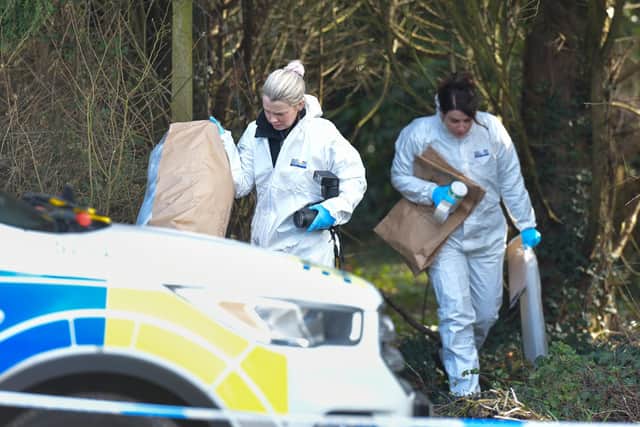 Police forensics at the scene after a baby was found dead in woodlands in Hythe, near Southampton. Picture: Solent News & Photo Agency