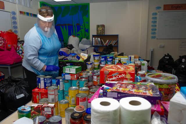 Jan Barnett with the donations at Bidbury Junior School, Portsmouth on 23 November 2020. Picture: Habibur Rahman