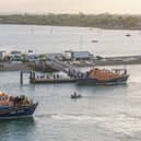 Around 140 migrants arrive in Portsmouth, Hampshire after being transferred from a single dingy south of the Isle of Wight in the English Channel by two RNLI lifeboats, a mammoth operation is talking place on Sunday evening to process the illegal migrants, with dozens of government workers from Police, Border Force, Ambulance and Fire crews, along with a number of transport busses.  Dated 06/09/26.