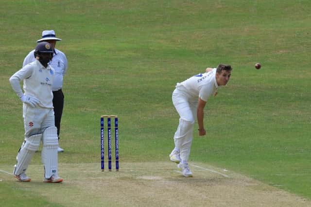 Joe Kooner-Evans in bowling action during Portsmouth's SPL Division 1 victory at Ventnor. Picture by Dave Reynolds