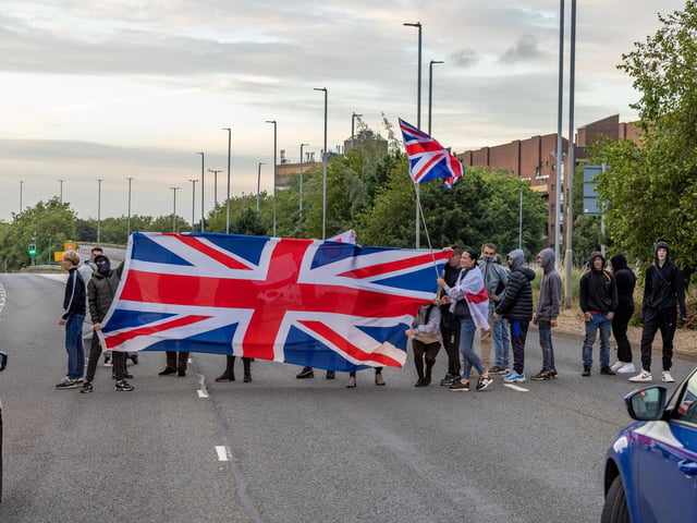 The M275 is brought to a standstill by anti-immigration protesters. Picture: Mike Cooter (070824)
