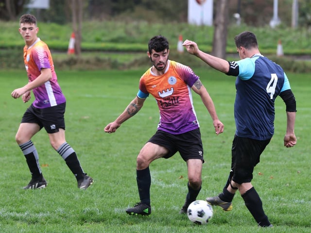 Fundraising (blue) v King George Rovers. Picture: Sam Stephenson.