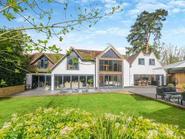 This property comes with six bedrooms, five bathrooms and five reception rooms as well as a swimming pool and a gym.