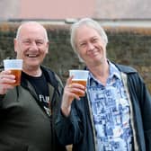 Alex Hood and Jon MacDonald from Portsmouth enjoy a beer at the last Community May Fayre in Fratton in 2019. Picture: Sarah Standing (060519-7147)