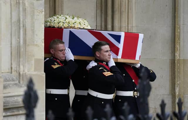 Pallbearers carry the coffin of Major General Matthew Holmes, the former head of the Royal Marines, out of Winchester Cathedral in Hampshire following his funeral service. Maj Gen Holmes commanded 42 Commando Royal Marines from 2006 to 2008 and was appointed as a Companion of the Distinguished Service Order for his leadership on operations in Afghanistan in 2007. Picture date: Wednesday October 13, 2021.