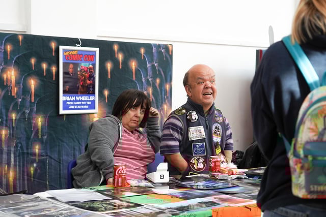 Brian Wheeler from Harry Potter and Star Wars at Comic Con, writing signatures in Gosport. Pictured is: Brian Wheeler Picture: Alec Chapman