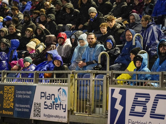 Pompey fans braved terrible weather conditions on New Year's Day to cheer the Blues to victory against Swansea.