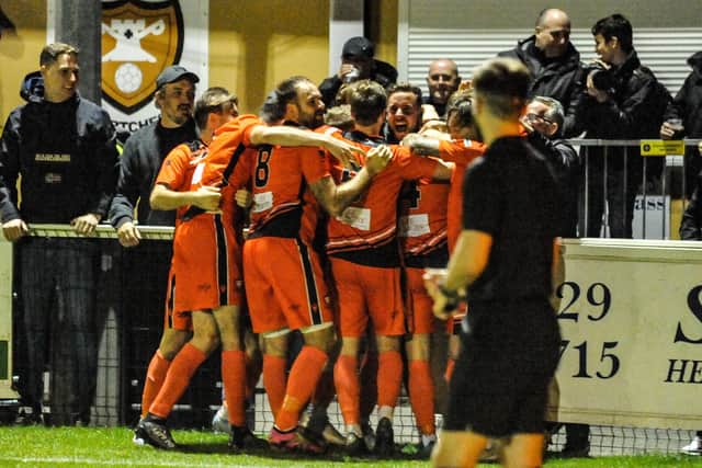 Jake Raine is mobbed after  his winner. Picture by Daniel Haswell