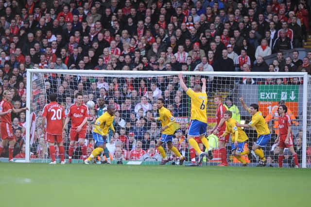 Hawks stun the Kop by taking the lead in their FA Cup fourth round tie at Liverpool in January 2008. Pic: Allan Hutchings.