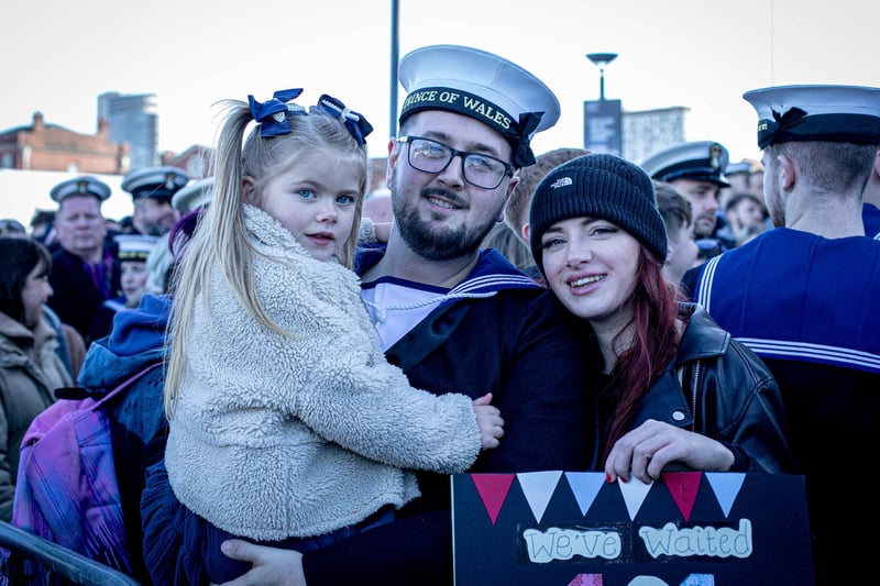 Pictured: Danielle Lawry, with her daughter Leah, four, of Gosport, welcoming Liam Burrows home after his deployment. Picture: Habibur Rahman.