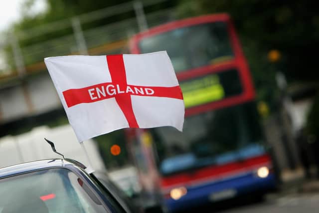 England flag on a car  (Photo by Daniel Berehulak/Getty Images)