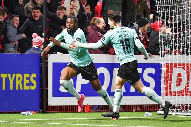 Ex-Pompey man Destiny Ojo celebrates scoring a late winner in Cliftonville's BetMcLean Cup semi-final triumph over Larne.  Picture: Andrew McCarroll/Pacemaker Press