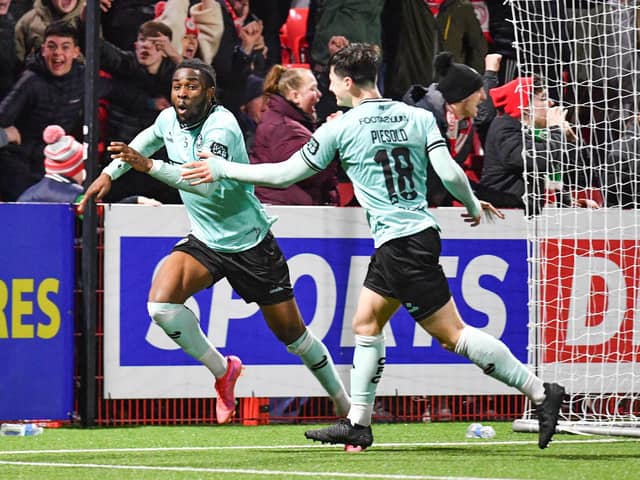 Ex-Pompey man Destiny Ojo celebrates scoring a late winner in Cliftonville's BetMcLean Cup semi-final triumph over Larne. Picture: Andrew McCarroll/Pacemaker Press