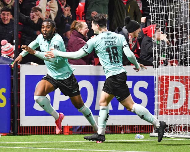 Ex-Pompey man Destiny Ojo celebrates scoring a late winner in Cliftonville's BetMcLean Cup semi-final triumph over Larne. Picture: Andrew McCarroll/Pacemaker Press