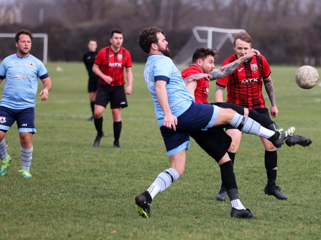 Portchester Rovers (blue) v Horndean United. Picture: Sam Stephenson.