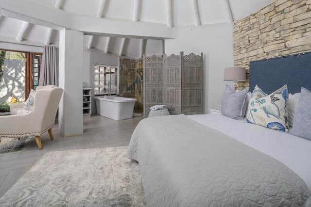 Guests stay in spacious and beautifully decorated private suites nestled in a 100-year-old garden.