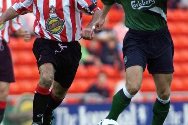 Sunderland's Kevin Ball pursues Liverpool midfielder Jamie Redknapp. Picture: Owen Humphreys/PA