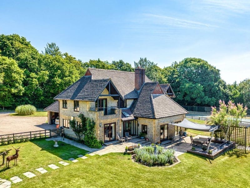 The listing says: "The High Hurlands estate occupies a magnificent position approximately 400 ft above sea level. The land, which extends to approximately 55.3 acres in total, sweeps towards the South with resplendent panoramic views over the surrounding countryside and the South Downs."