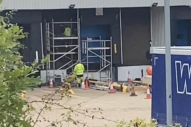 A woman died at Huhtamaki in Rowner Road, Gosport, after she was hit by a lorry