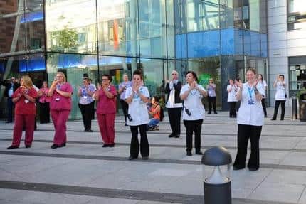 Staff at Queen Alexandra Hospital in Cosham taking part in the Clap for Carers. Picture: Sarah Standing