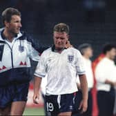 A generation mentally scarred by losing to Germany on penalties - Paul Gascoigne is consoled by Terry Butcher after England's semi-final loss at Italia 90. Picture: Roberto Pfeil, AP
