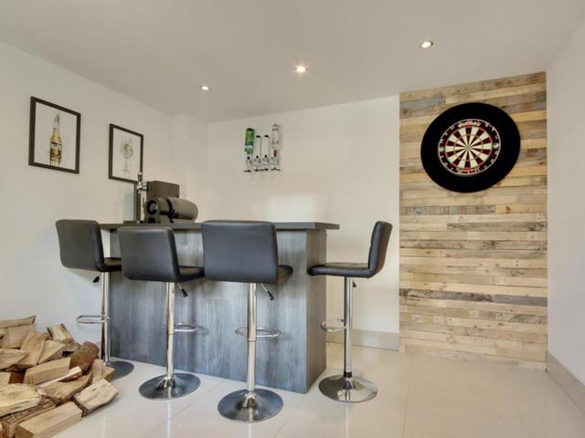 Chatsworth Avenue, Cosham, comes with a bar area in the outbuilding at the end of the garden.