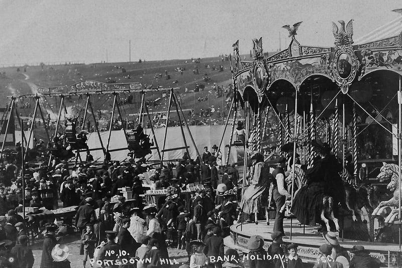 With a packed carousel and boat swings we see 1920's people at the Bank Holiday funfair on Portsdown Hill. Photo: Barry Cox postcard collection